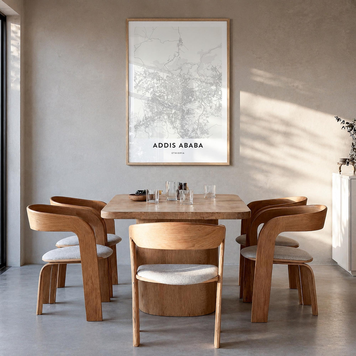 Addis Ababa black & white map poster of Ethiopia – vertical wall art in natural wood frame, hanging on wall