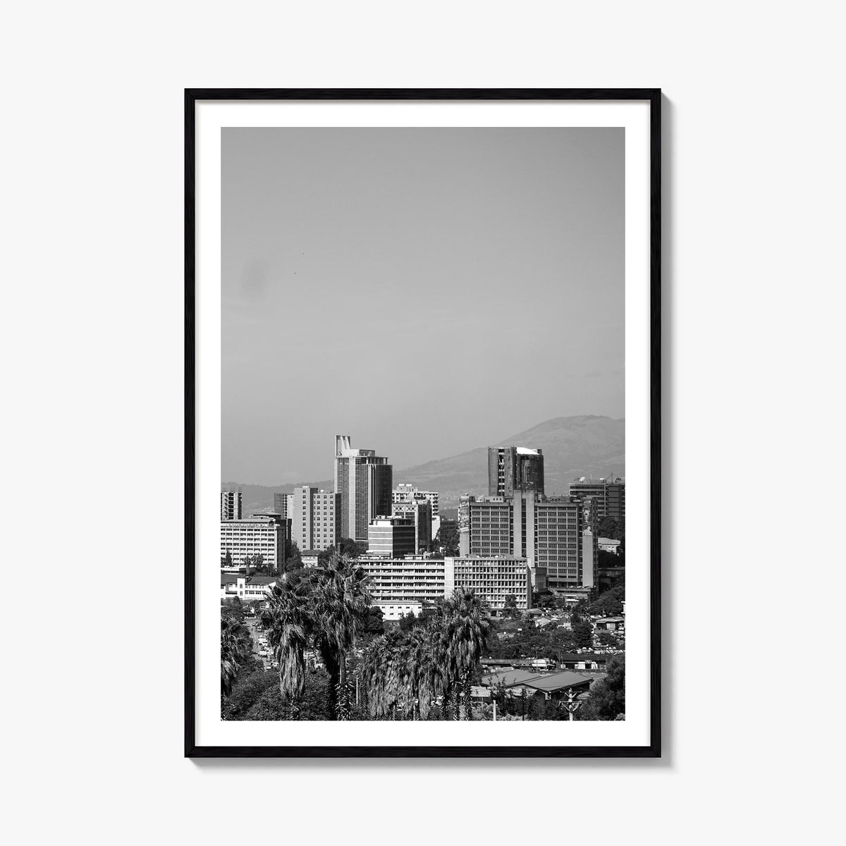 Addis Ababa black & white photo poster of Ethiopia – vertical wall art, unframed print shown in interior mockup