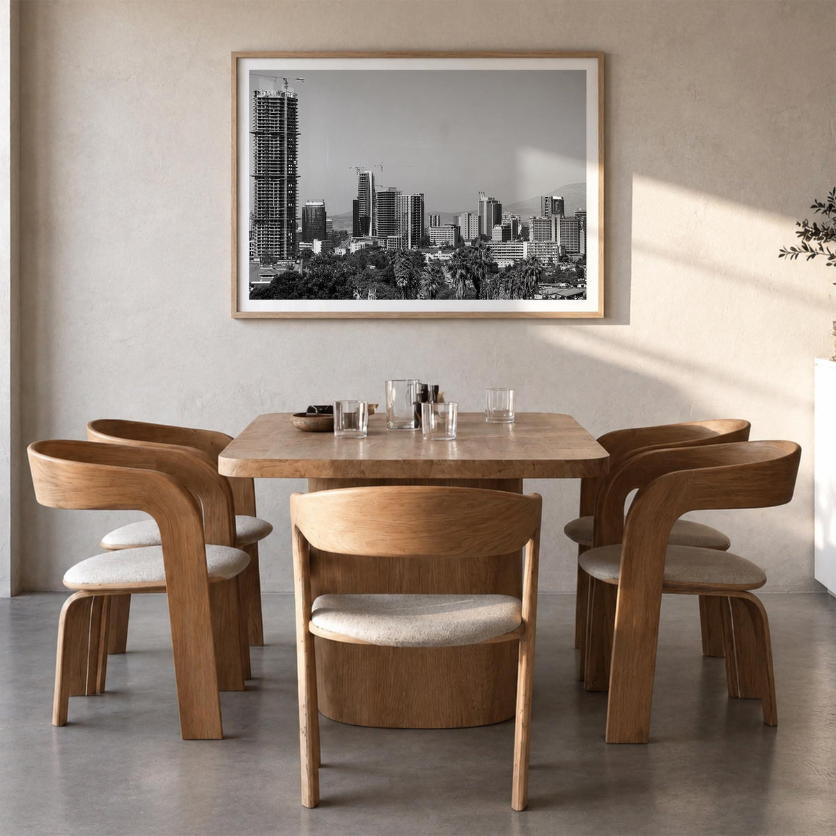 Addis Ababa black & white photo poster of Ethiopia – horizontal wall art in natural wood frame with white border, hanging on 