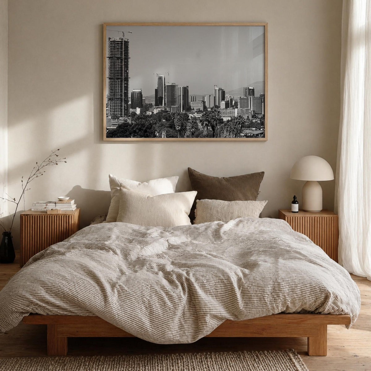 Addis Ababa black & white photo poster of Ethiopia – horizontal wall art in natural wood frame, hanging on wall