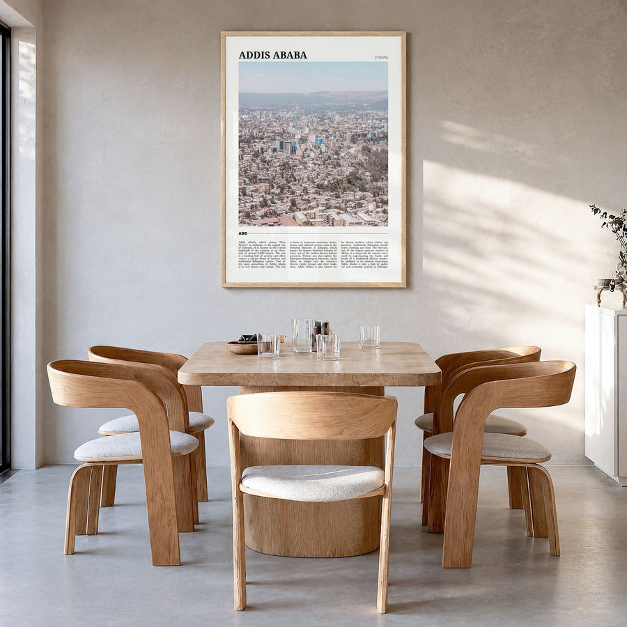 Addis Ababa Travel Poster in a natural wood frame, hanging in a dining room