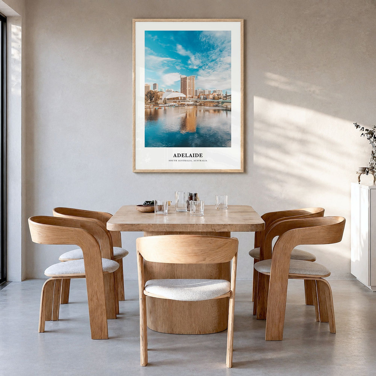Adelaide Classic Poster in a natural wood frame, hanging in a dining room