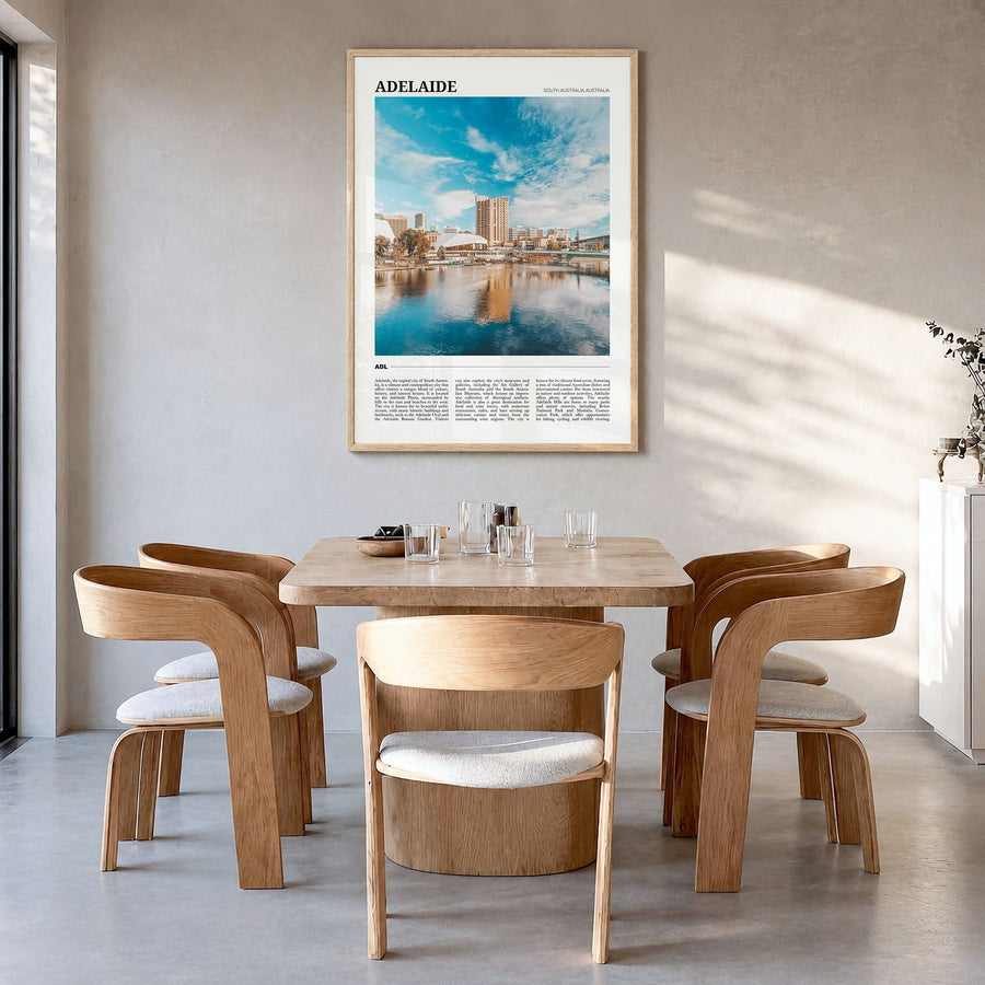 Adelaide Travel Poster in a natural wood frame, hanging in a dining room