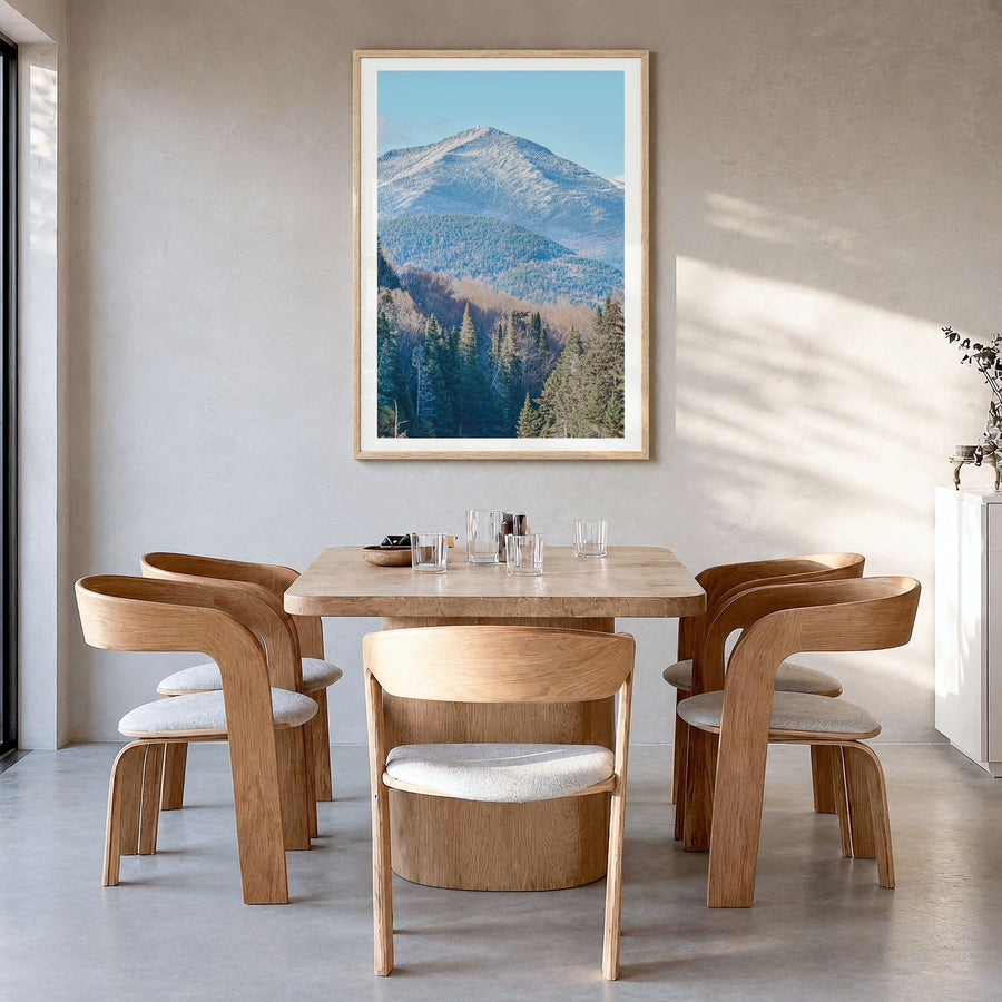 Adirondack Mountains Photo No 1 Poster in a natural wood frame, hanging in a dining room, white border
