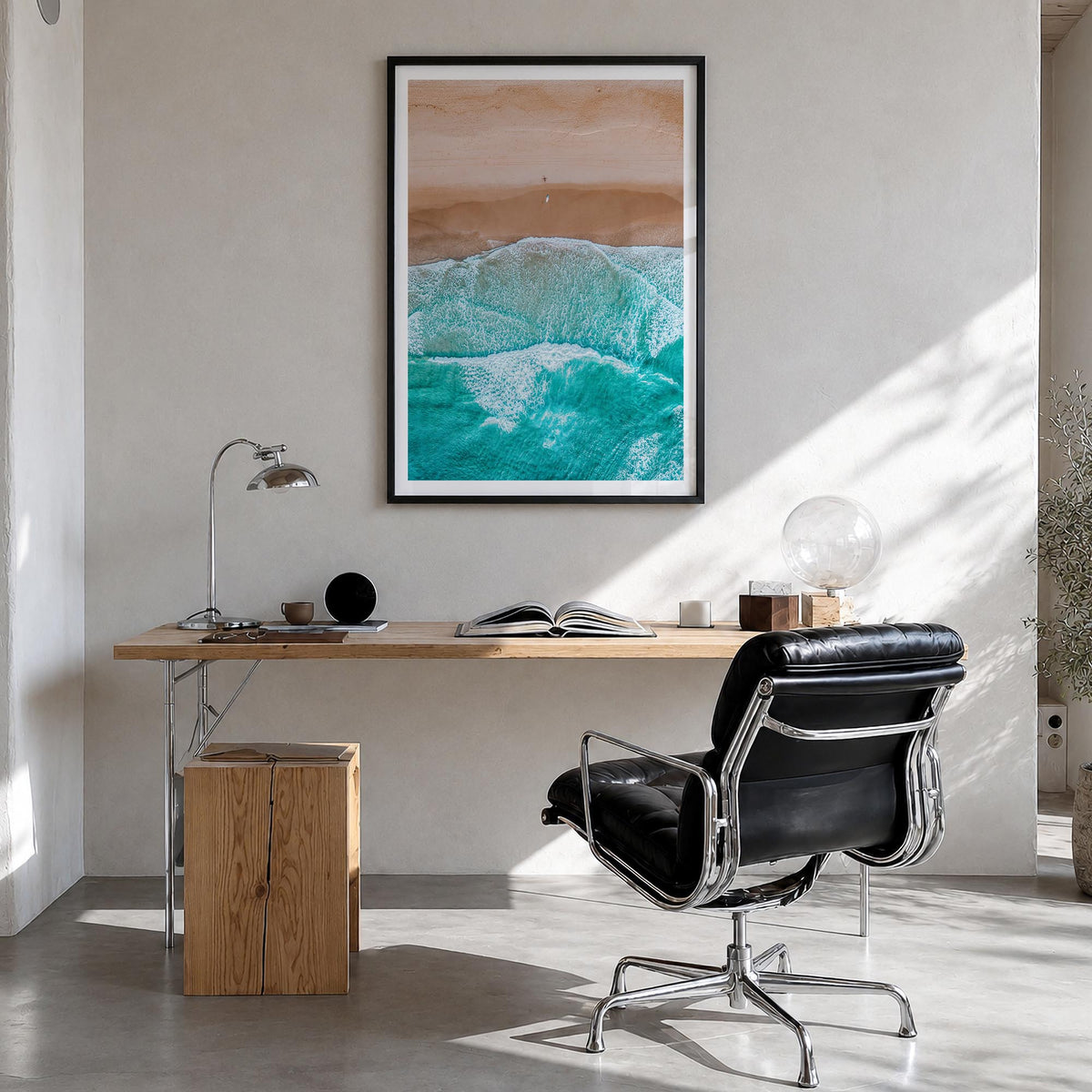 Aerial Beach Waves no. 2 colorful photo poster – vertical wall art in black wood frame with white border, hanging on wall