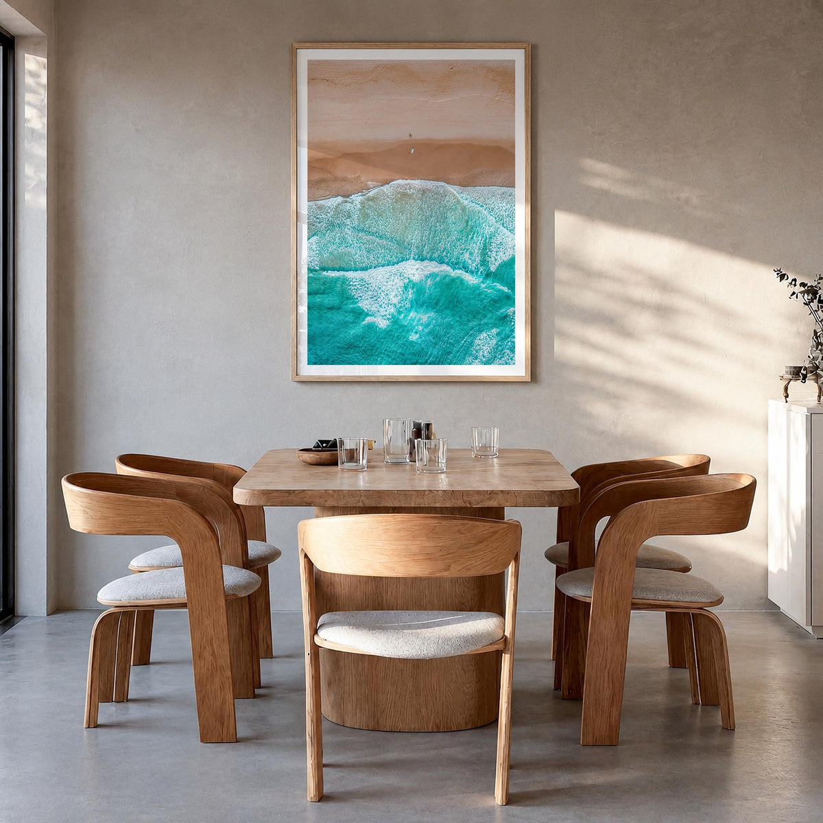 Aerial Beach Waves no. 2 colorful photo poster – vertical wall art in natural wood frame with white border, hanging on wall
