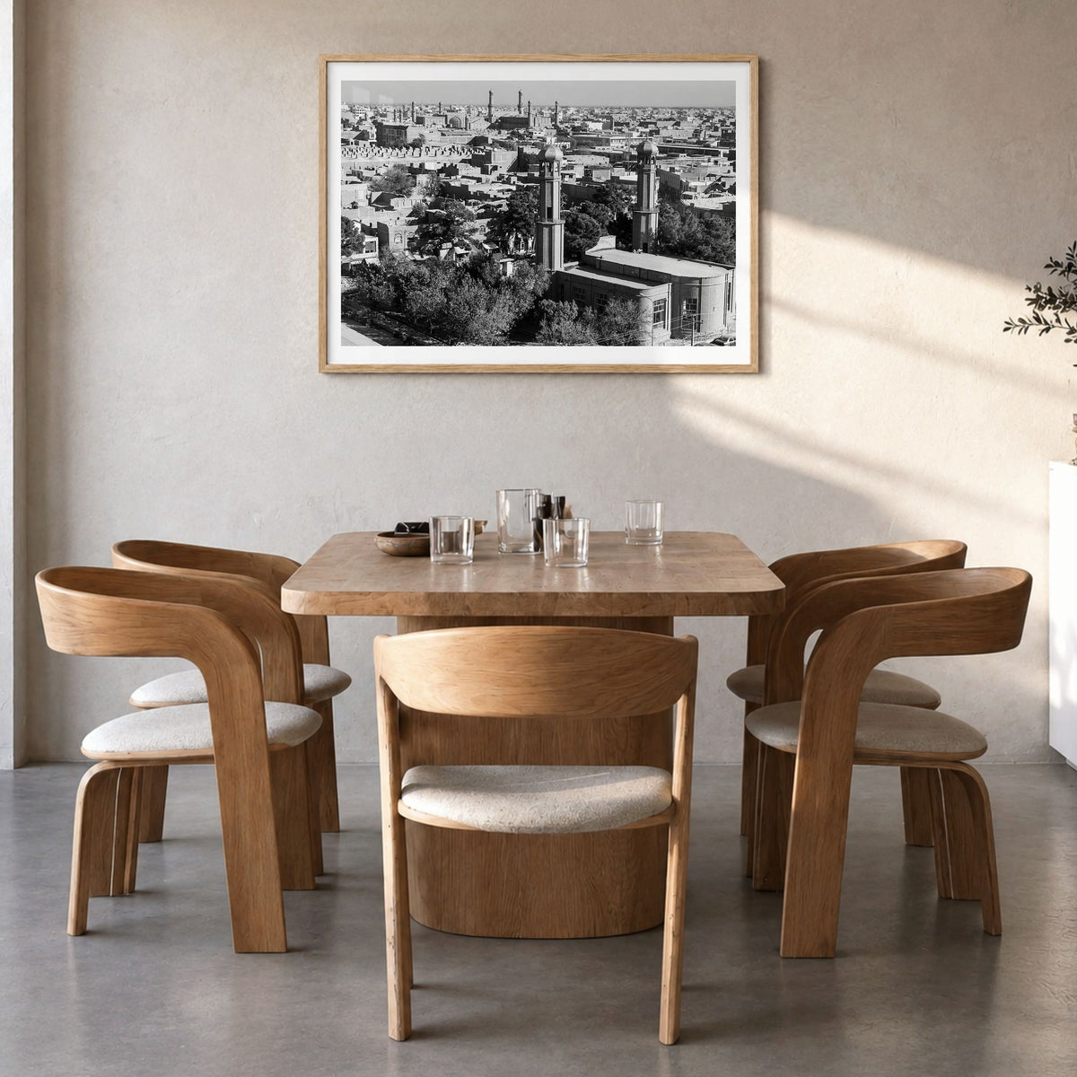 Afghanistan Photo Poster in a natural wood frame, hanging in a dining room, white border