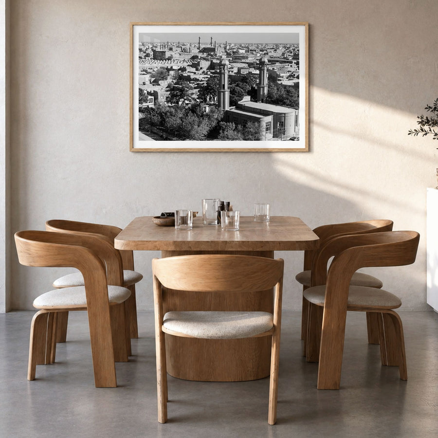 Afghanistan Photo Poster in a natural wood frame, hanging in a dining room, white border