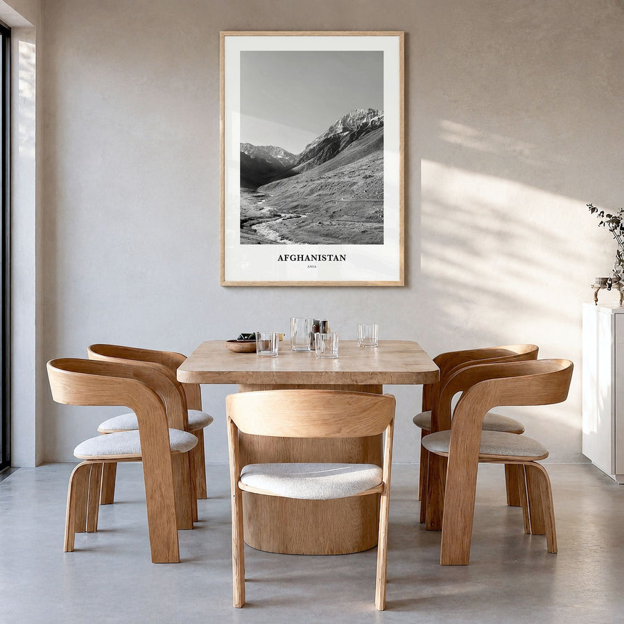 Afghanistan Classic No 1 Poster in a natural wood frame, hanging in a dining room