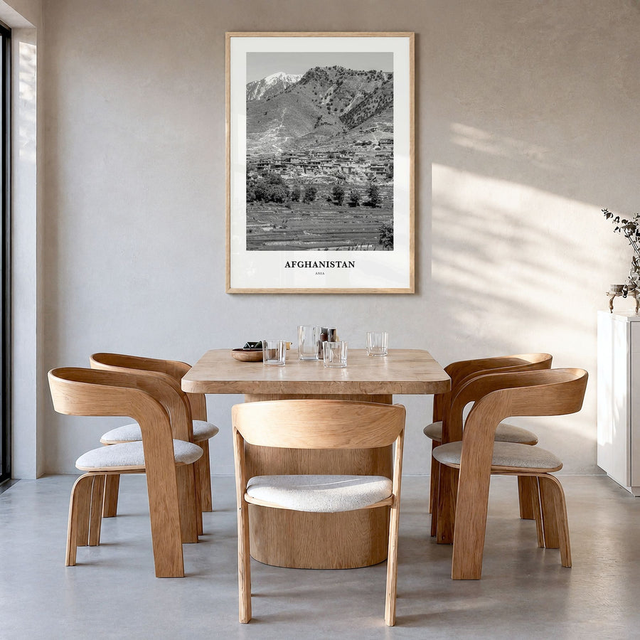 Afghanistan Classic No 2 Poster in a natural wood frame, hanging in a dining room