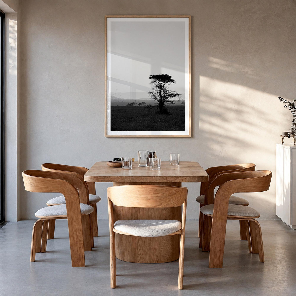 Africa black & white photo poster of World – vertical wall art in natural wood frame with white border, hanging on wall