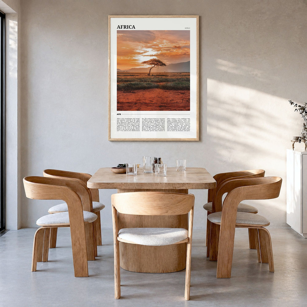 Africa Travel Poster in a natural wood frame, hanging in a dining room
