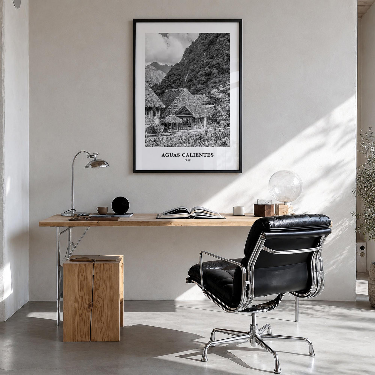 Aguas Calientes black & white classic poster of Peru – vertical wall art in black wood frame, hanging on wall