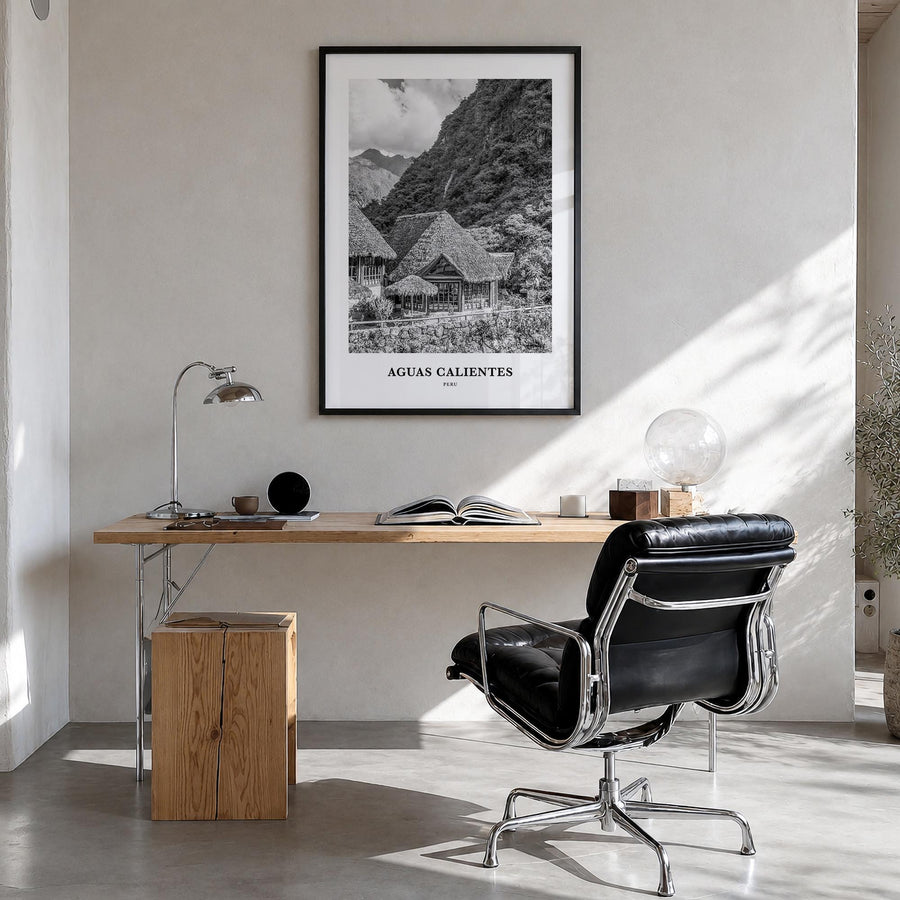 Aguas Calientes black & white classic poster of Peru – vertical wall art in black wood frame, hanging on wall
