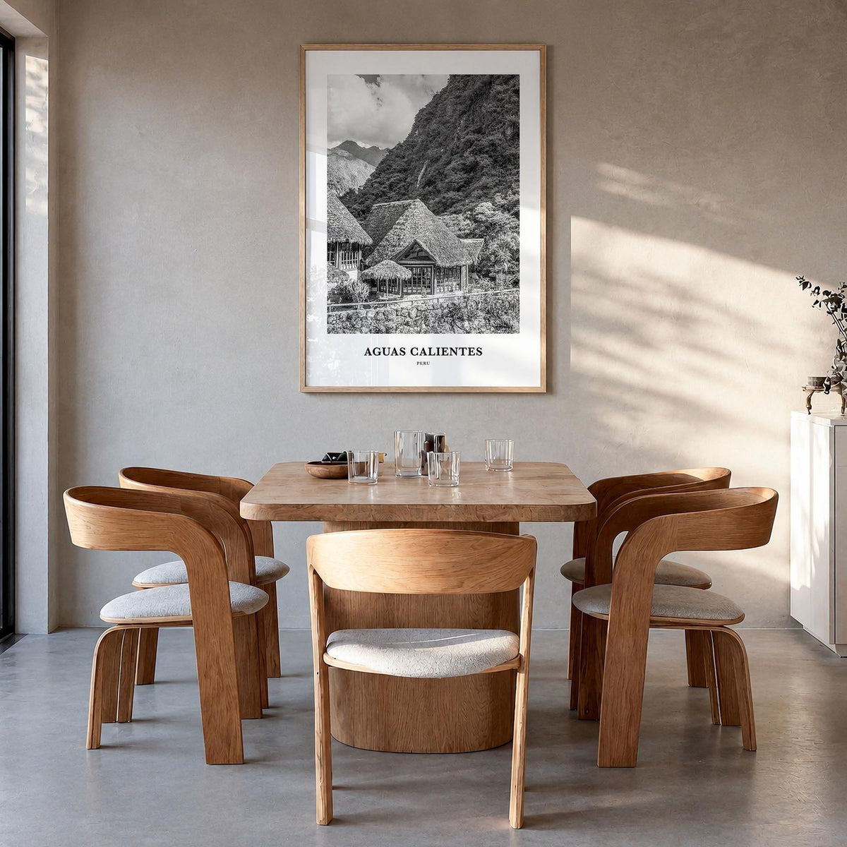 Aguas Calientes black & white classic poster of Peru – vertical wall art in natural wood frame, hanging on wall