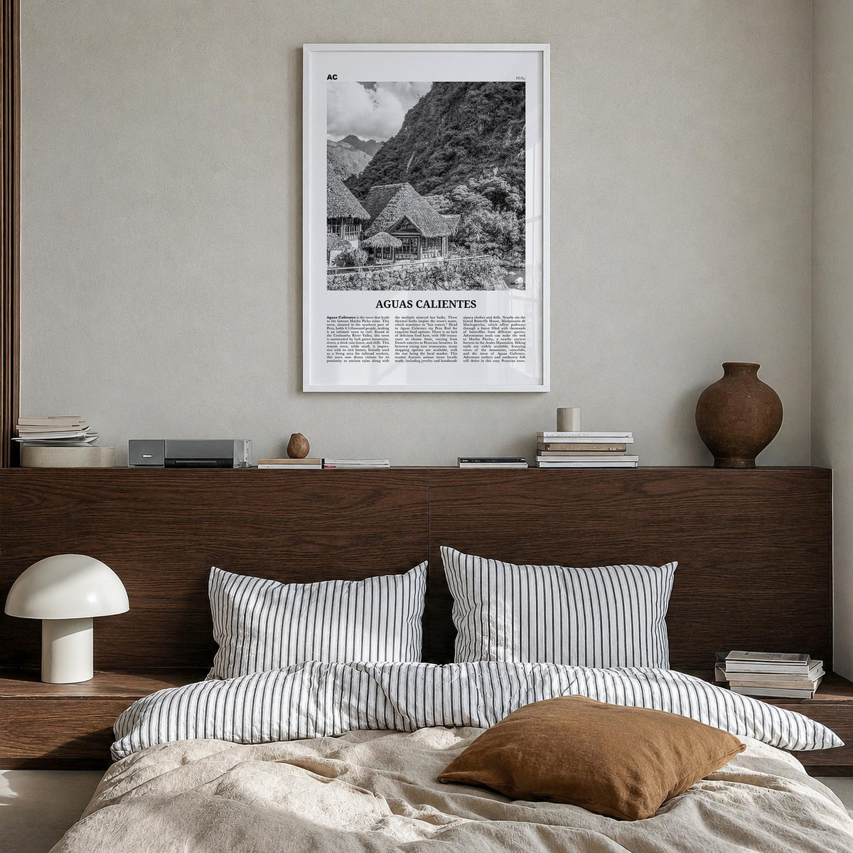 Aguas Calientes black & white newspaper poster of Peru – vertical wall art in white wood frame, hanging on wall