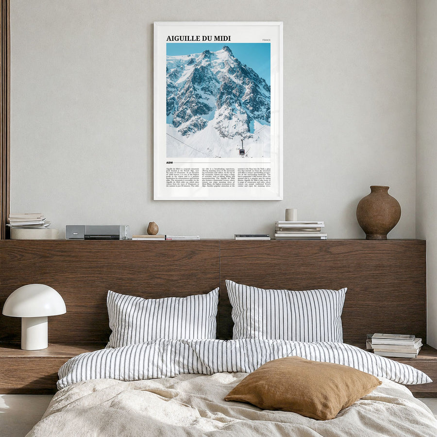 Aiguille du Midi Travel Poster in a white wood frame, hanging in a bedroom