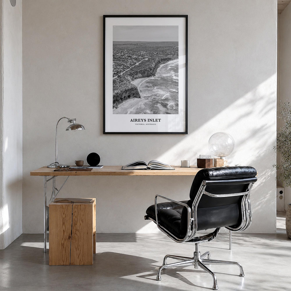 Aireys Inlet black & white classic poster of Victoria, Australia – vertical wall art in black wood frame, hanging on wall