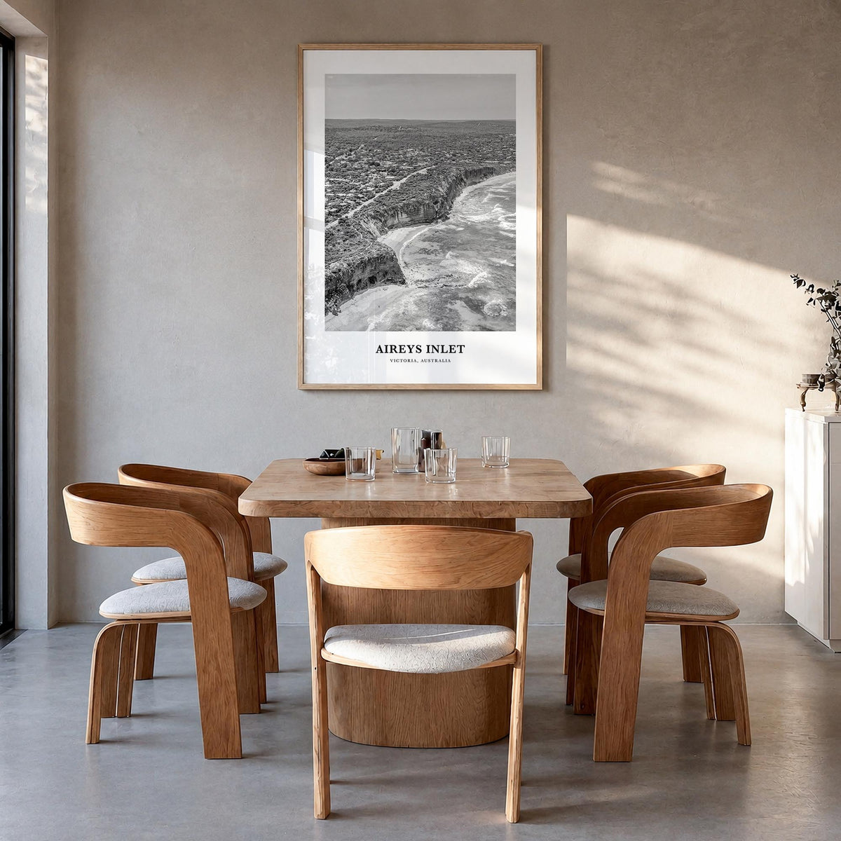 Aireys Inlet black & white classic poster of Victoria, Australia – vertical wall art in natural wood frame, hanging on wall