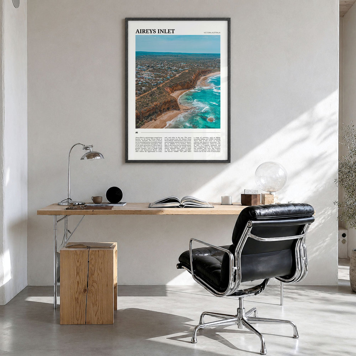 Aireys Inlet Travel Poster in a black wood frame, hanging in a bright home office