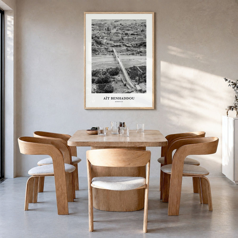 Aït Benhaddou Classic Poster in a natural wood frame, hanging in a dining room