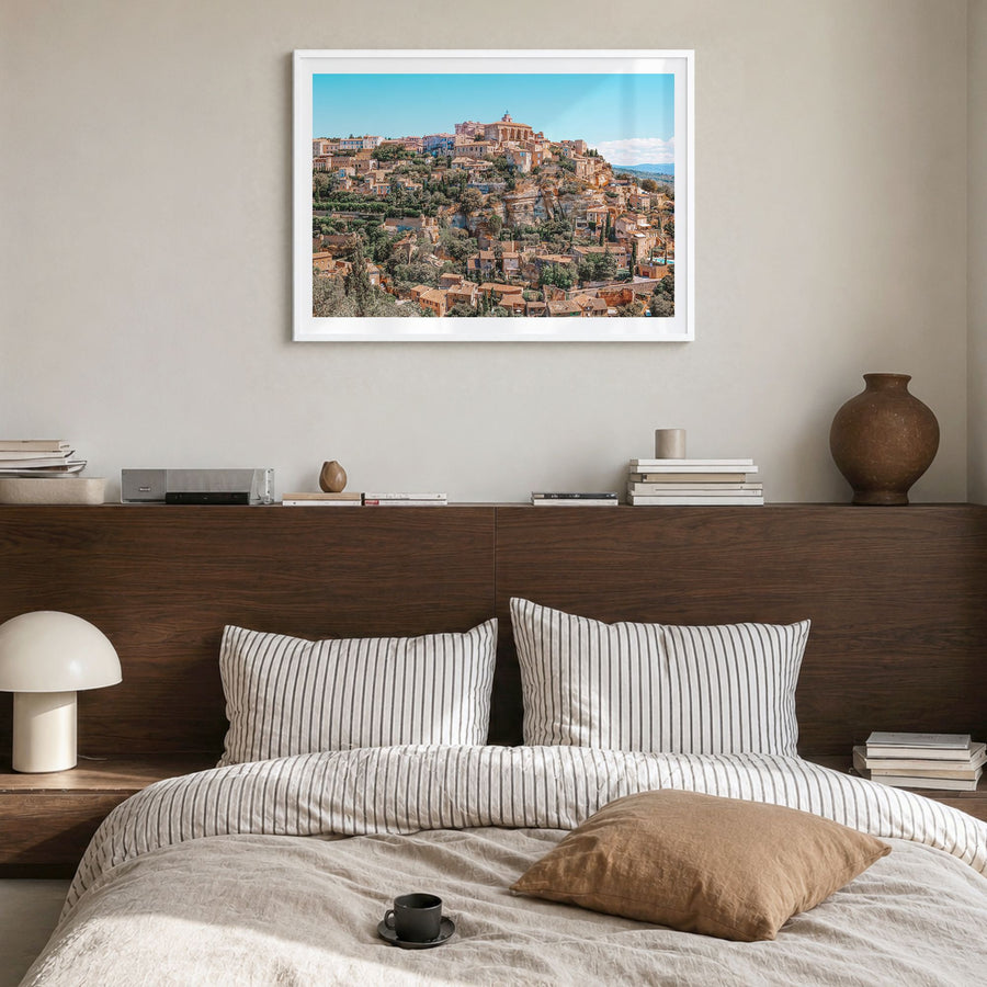 Aix-en-Provence Photo Poster in a white wood frame, hanging in a bedroom, white border