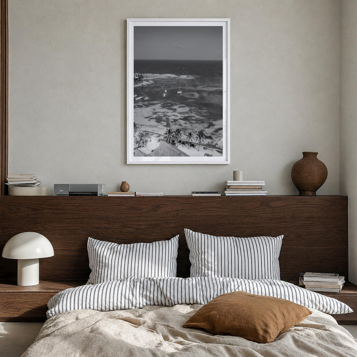 Akumal black & white photo poster of Mexico – vertical wall art in white wood frame with white border, hanging on wall