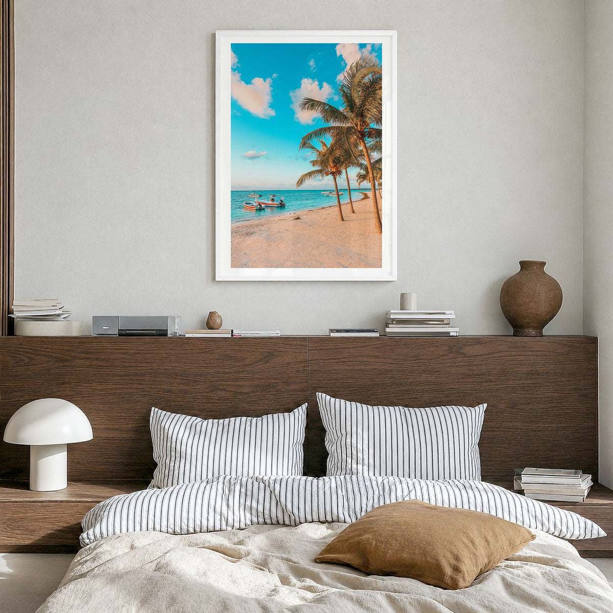 Akumal Photo Poster in a white wood frame, hanging in a bedroom, white border