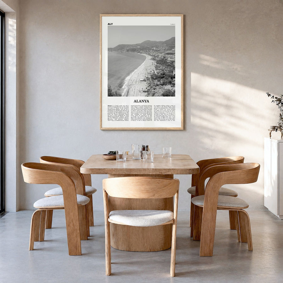 Alanya Newspaper Poster in a natural wood frame, hanging in a dining room