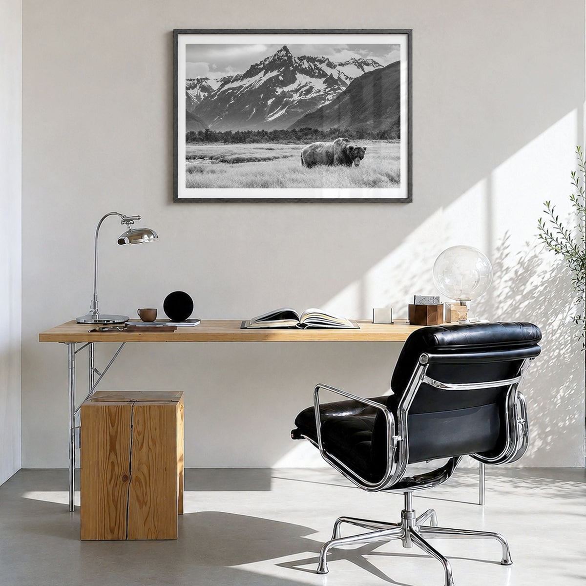 Alaska Photo Poster in a black wood frame, hanging in a bright home office, white border