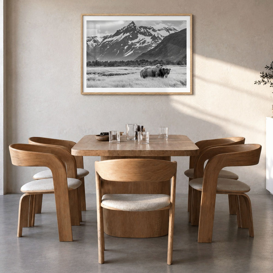 Alaska Photo Poster in a natural wood frame, hanging in a dining room, white border