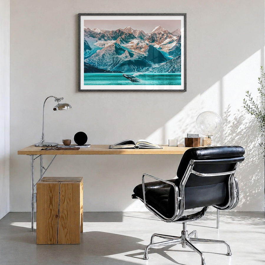 Alaska Photo Poster in a black wood frame, hanging in a bright home office, white border