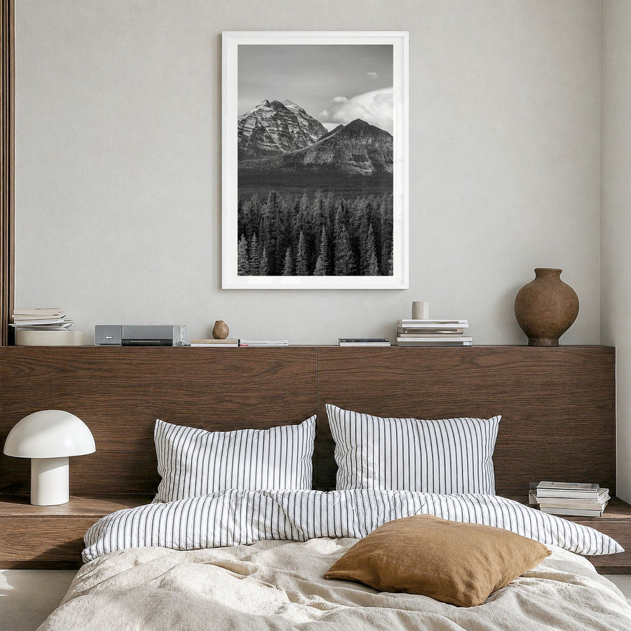 Alberta Photo Poster in a white wood frame, hanging in a bedroom, white border