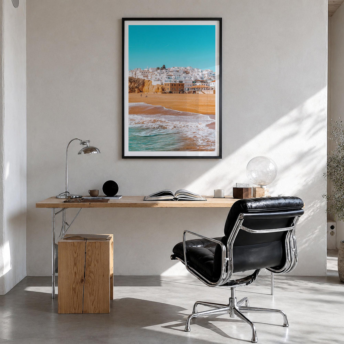 Albufeira colorful photo poster of Portugal – vertical wall art in black wood frame with white border, hanging on wall