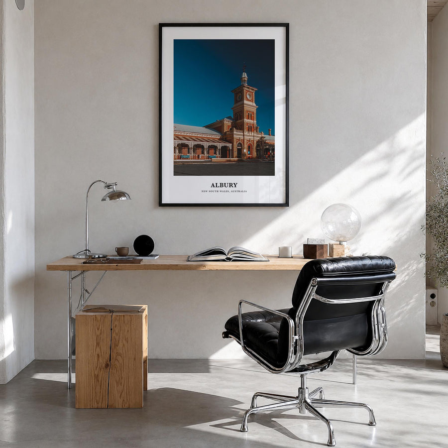 Albury colorful classic poster of Australia – vertical wall art in black wood frame, hanging on wall