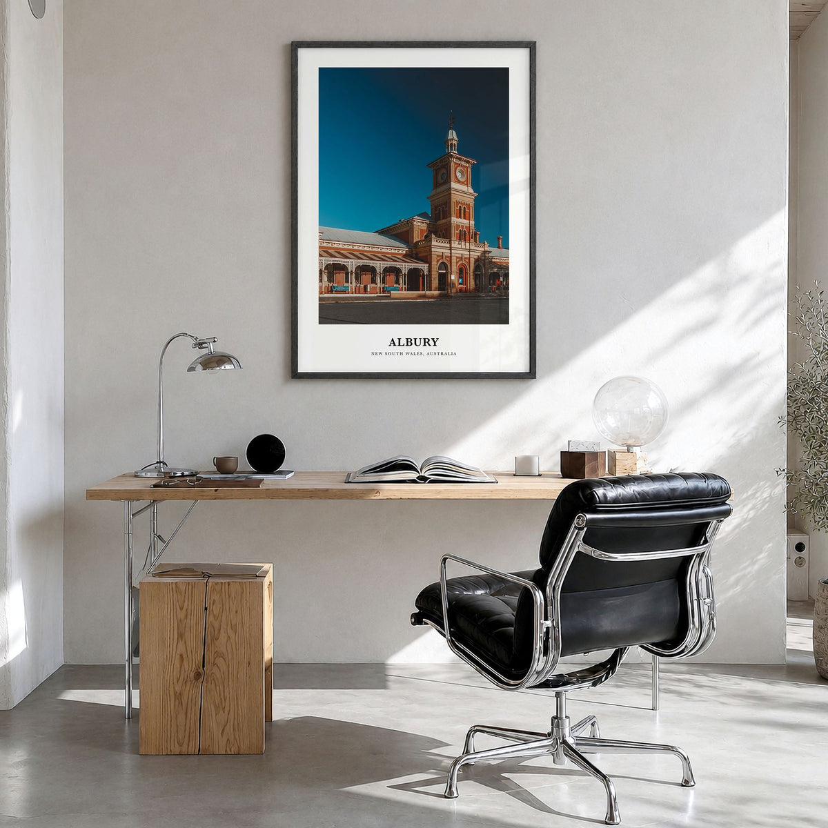 Albury Classic Poster in a black wood frame, hanging in a bright home office