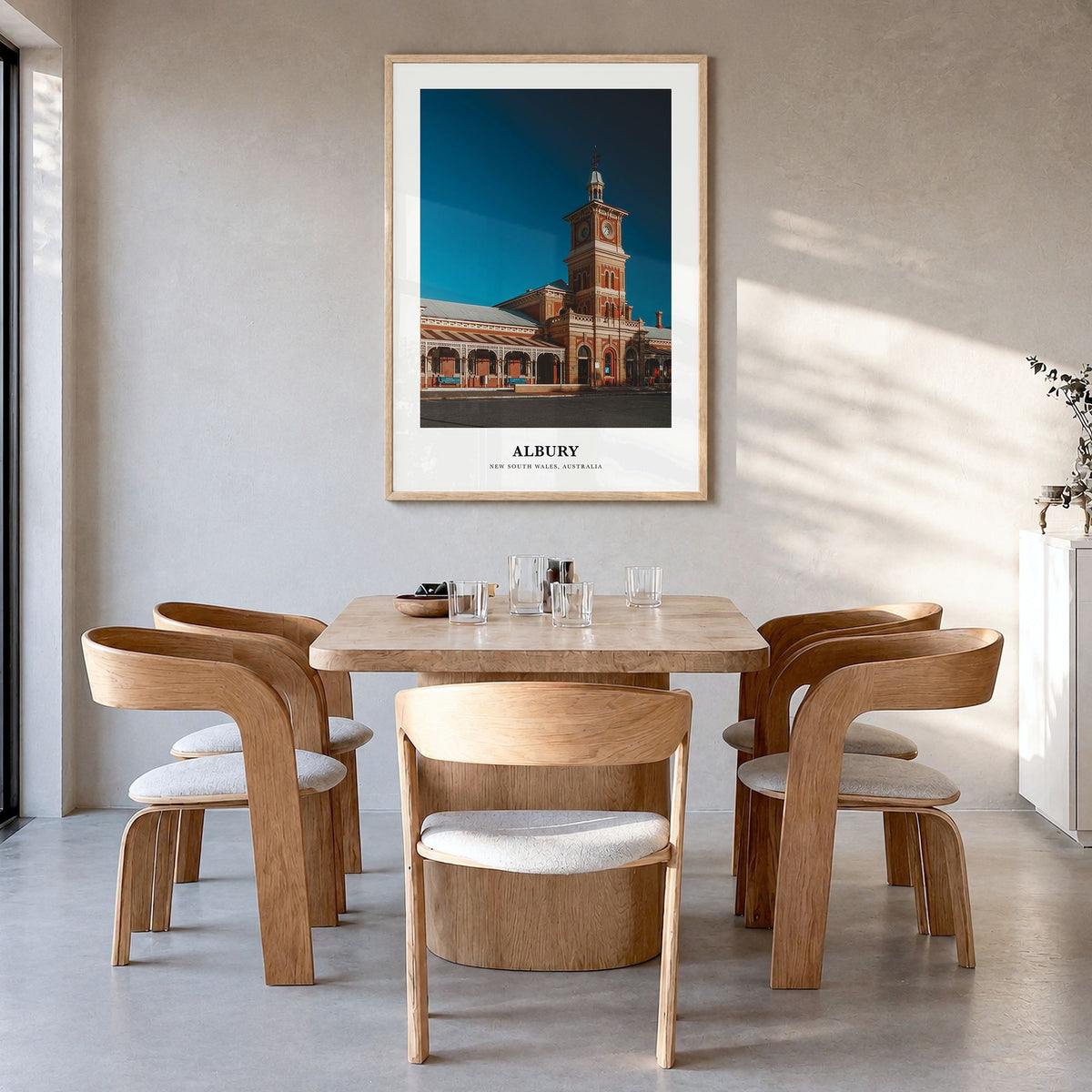 Albury Classic Poster in a natural wood frame, hanging in a dining room