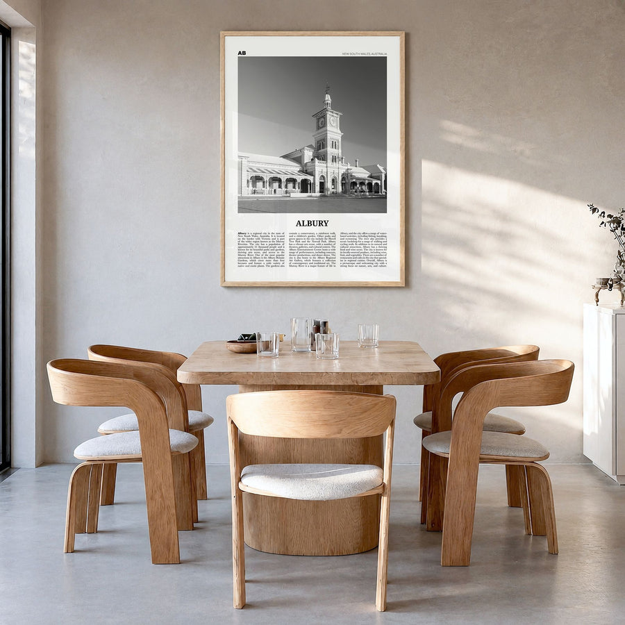 Albury Newspaper Poster in a natural wood frame, hanging in a dining room
