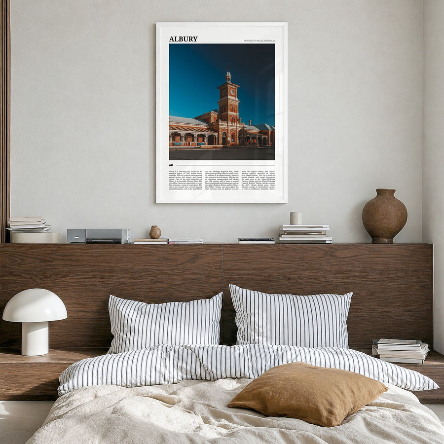 Albury Travel Poster in a white wood frame, hanging in a bedroom