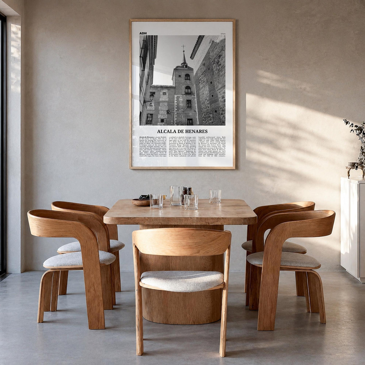 Alcalá de Henares black & white newspaper poster of Spain – vertical wall art in natural wood frame, hanging on wall