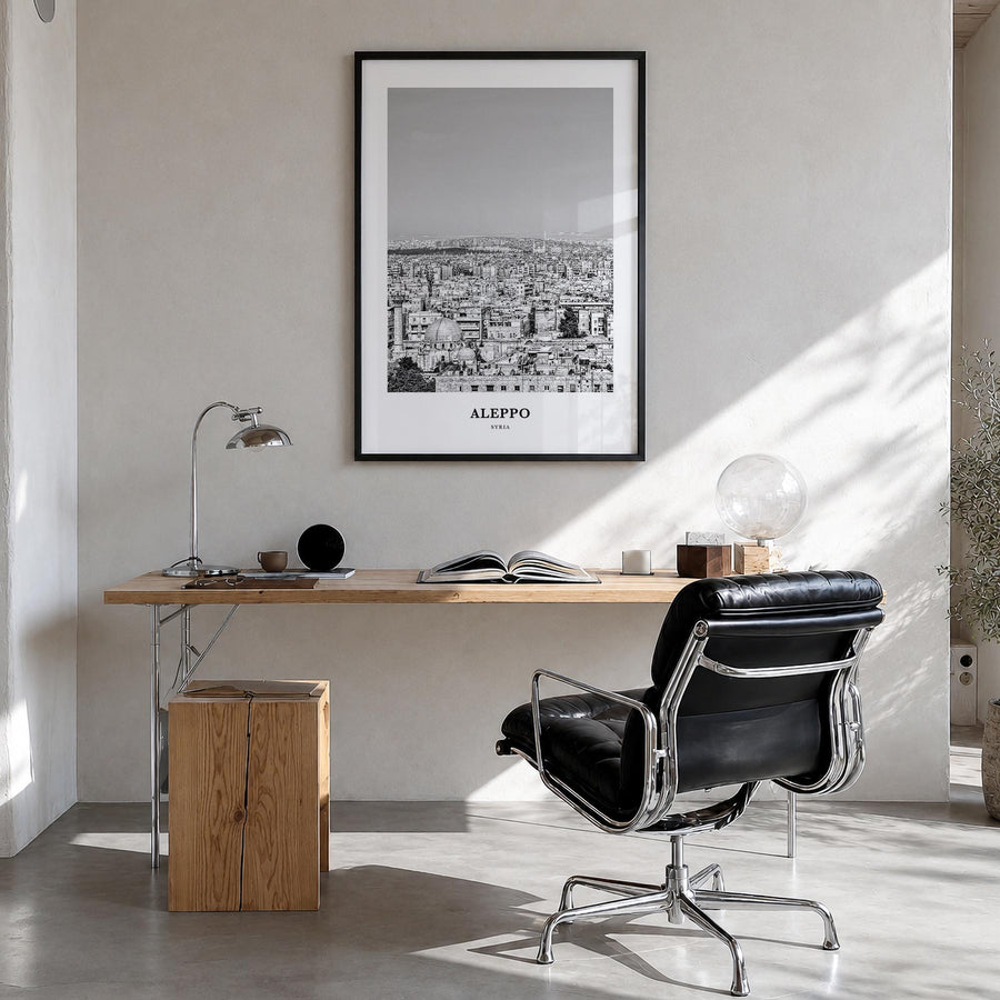 Aleppo black & white classic poster of Syria – vertical wall art in black wood frame, hanging on wall