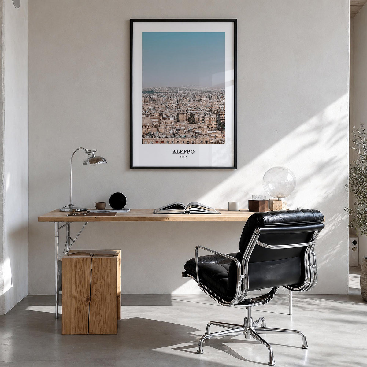 Aleppo colorful classic poster of Syria – vertical wall art in black wood frame, hanging on wall