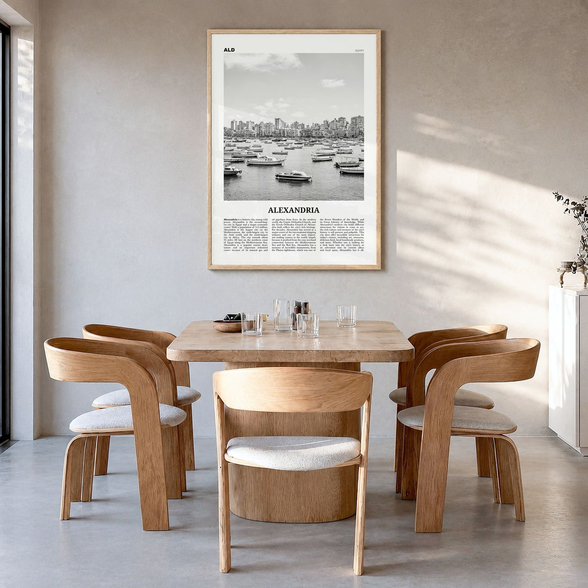 Alexandria, Egypt Newspaper Poster in a natural wood frame, hanging in a dining room