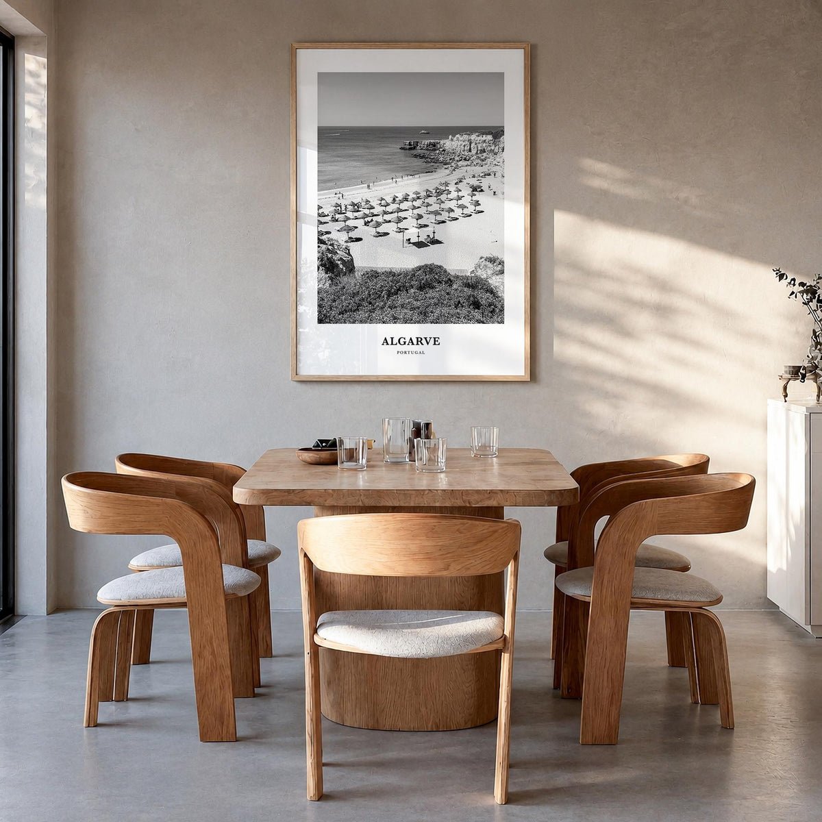 Algarve black & white classic poster of Portugal – vertical wall art in natural wood frame, hanging on wall