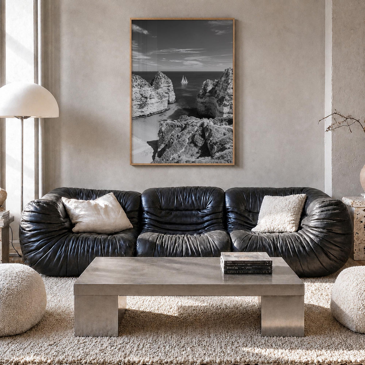 Algarve black & white photo poster of Portugal – vertical wall art in natural wood frame, hanging on wall
