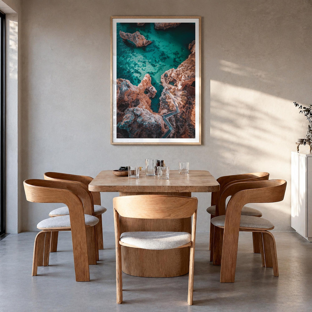 Algarve no. 1 colorful photo poster of Portugal – vertical wall art in natural wood frame with white border, hanging on wall