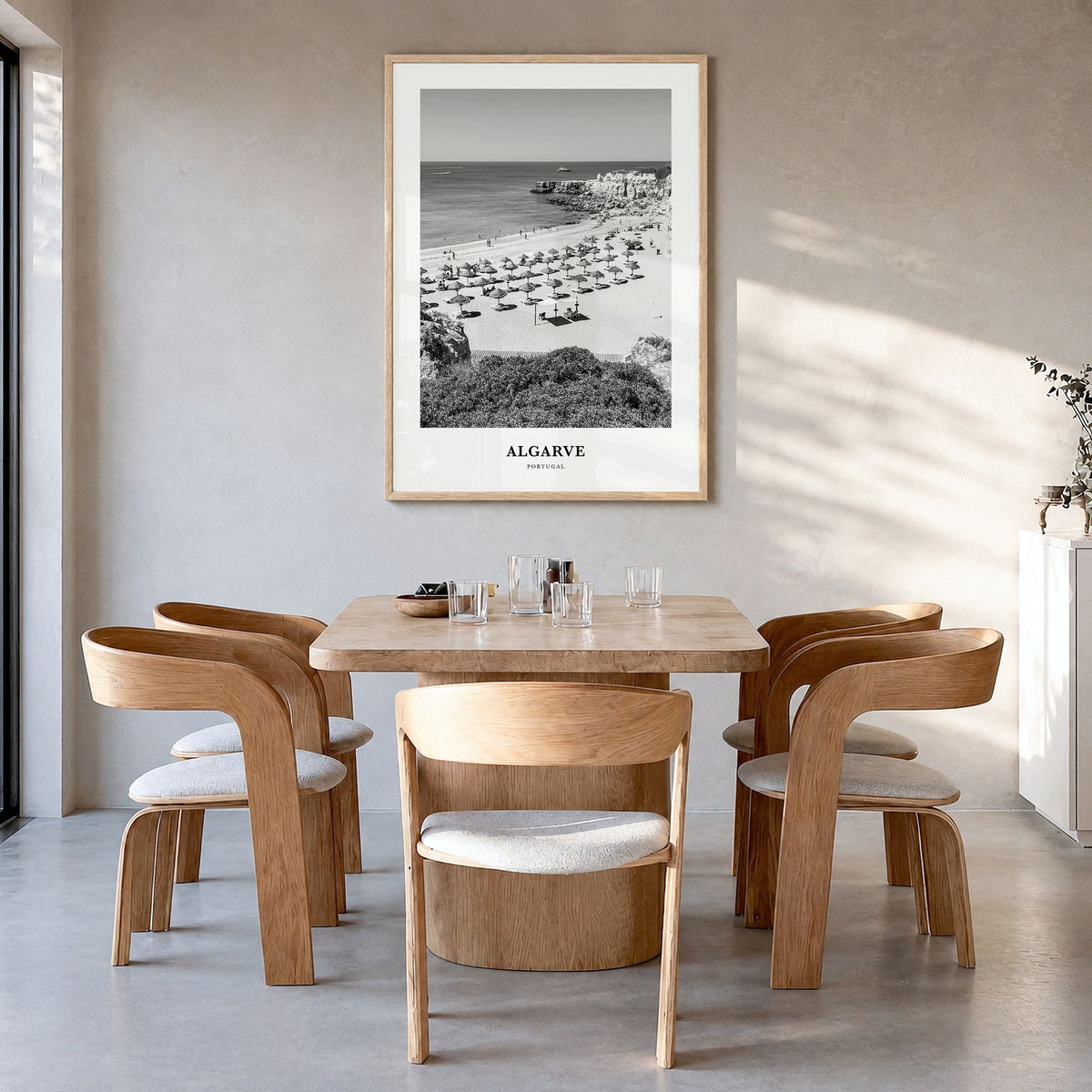 Algarve Classic Poster in a natural wood frame, hanging in a dining room