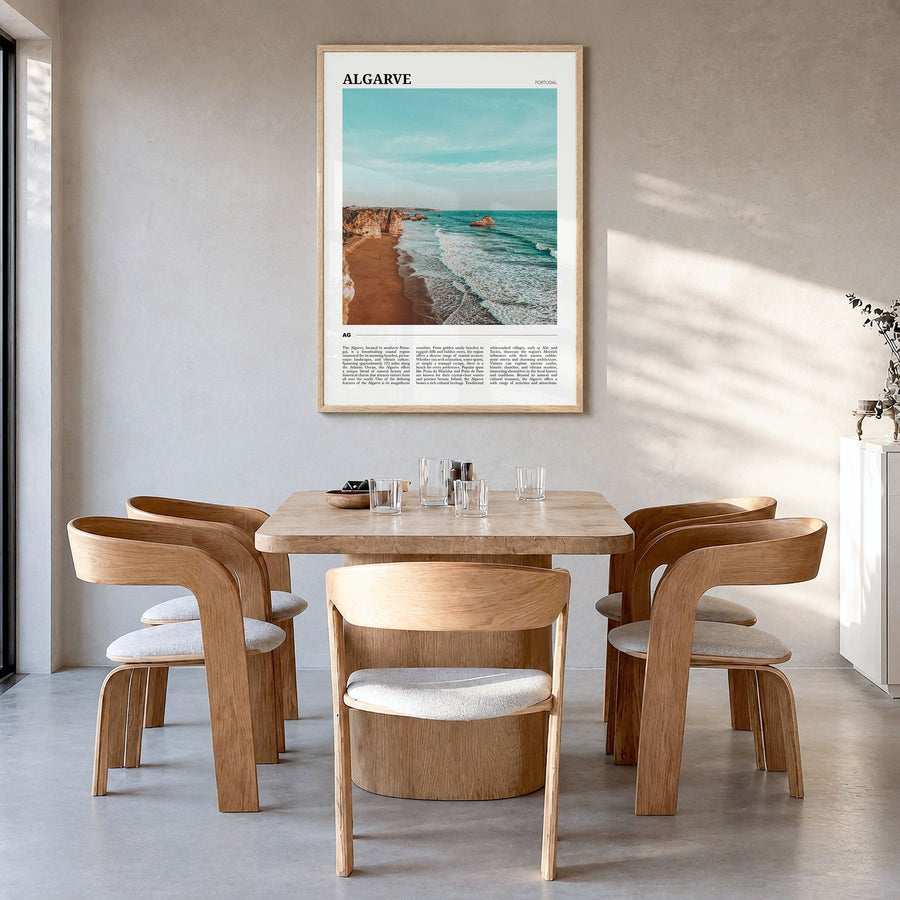 Algarve Travel Poster in a natural wood frame, hanging in a dining room
