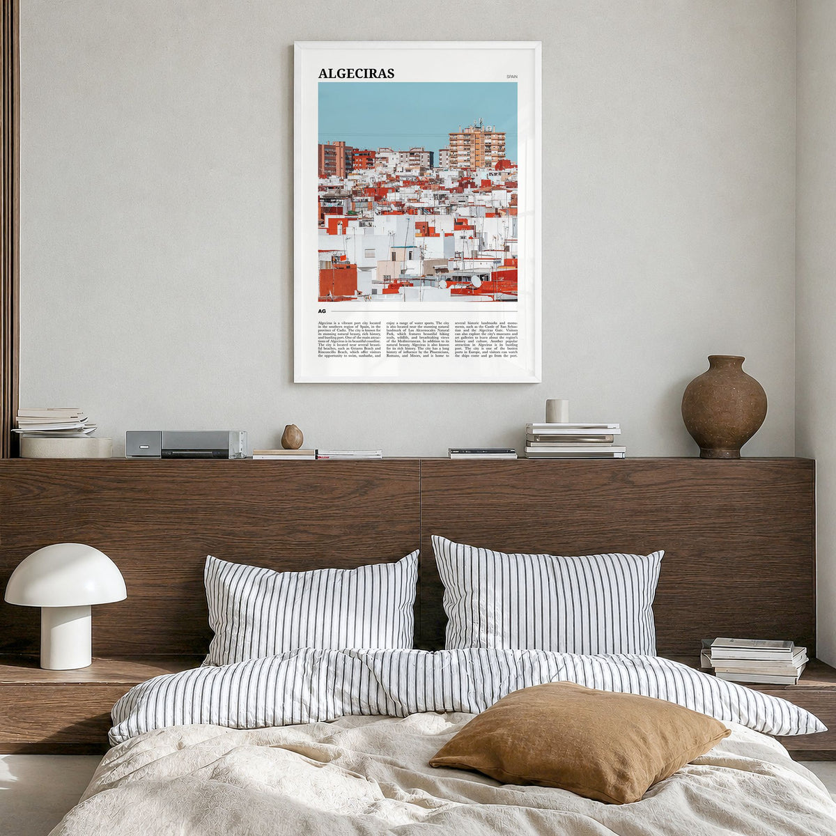 Algeciras Travel Poster in a white wood frame, hanging in a bedroom