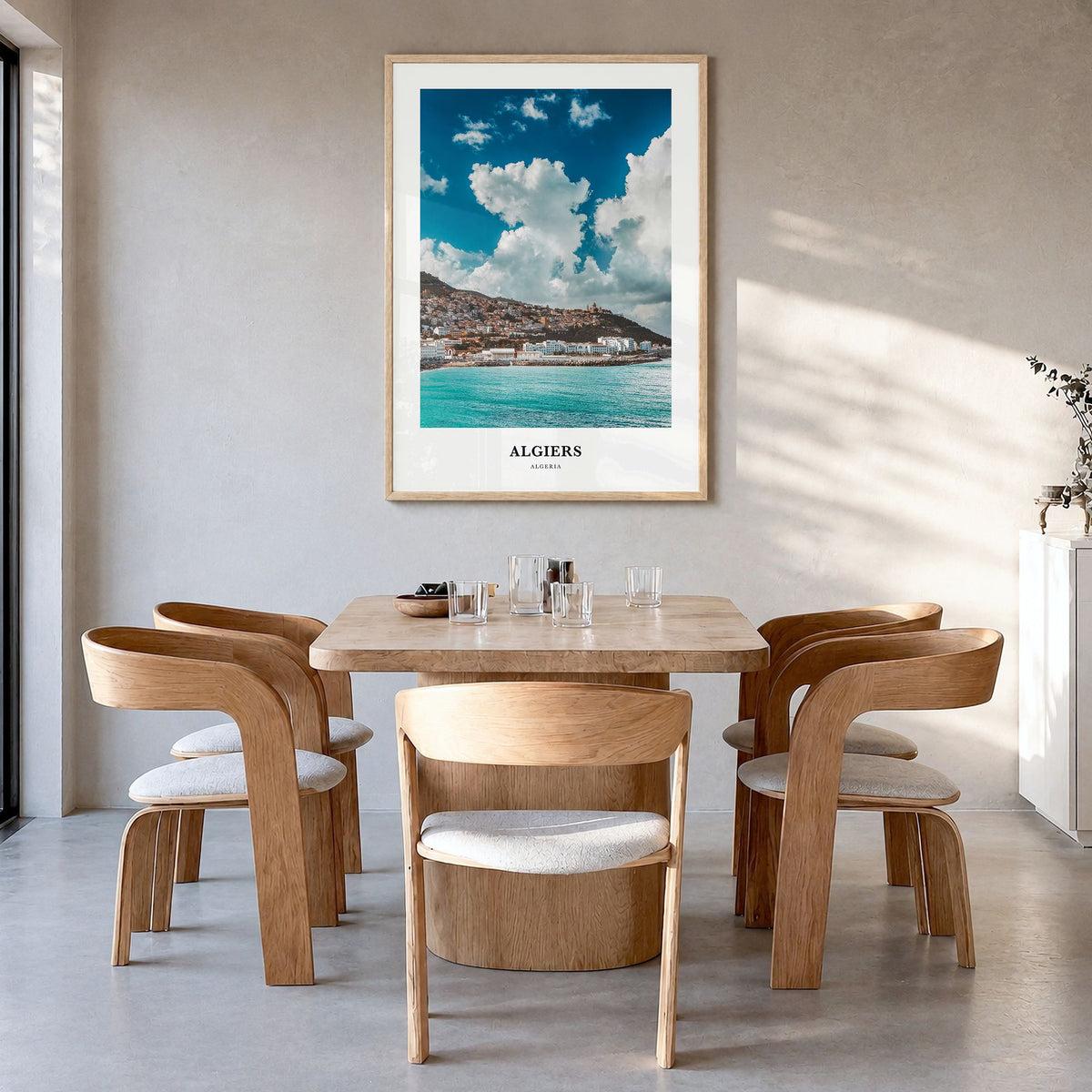 Algiers Classic Poster in a natural wood frame, hanging in a dining room